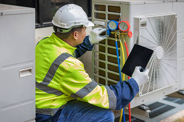 Professional Emergency Hvac Repair technician working in Neshanic Station, NJ